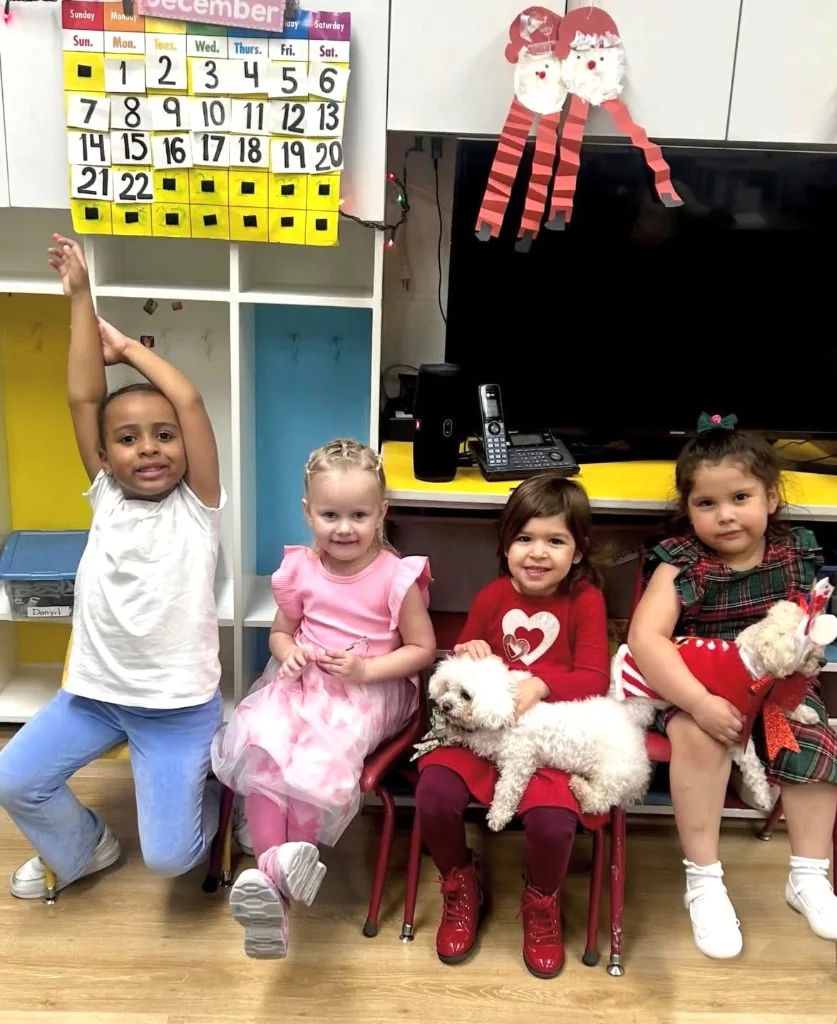 School programs — preschool students posing with Star Poodlez
